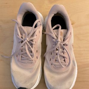 Nike- Pink Woman’s running shoes. Size 8.5